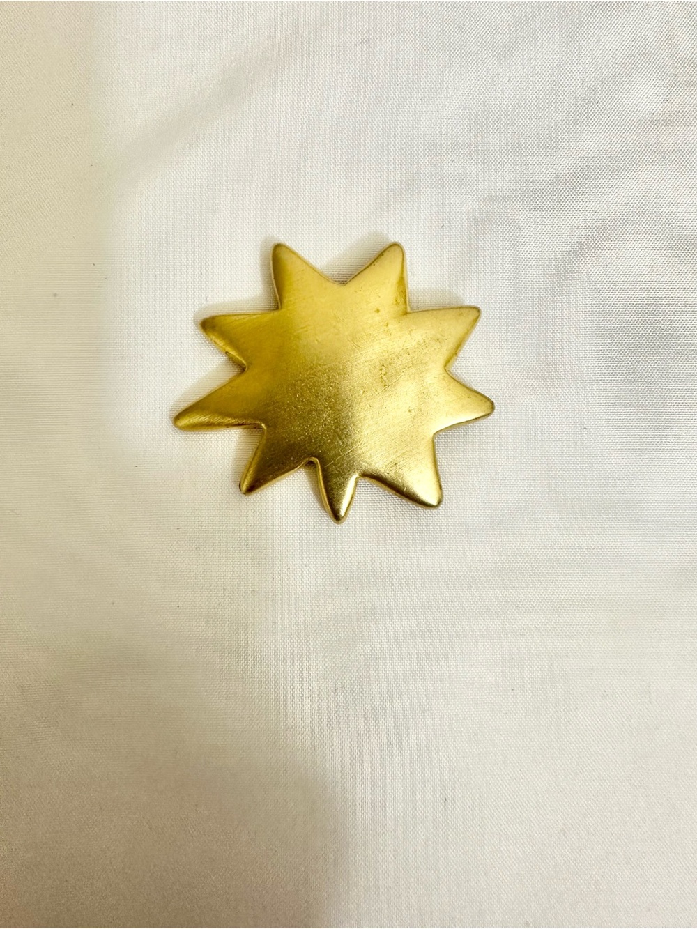 Vintage Matte-Gold Victoria’s Secret Stamped Brass Starburst Brooch